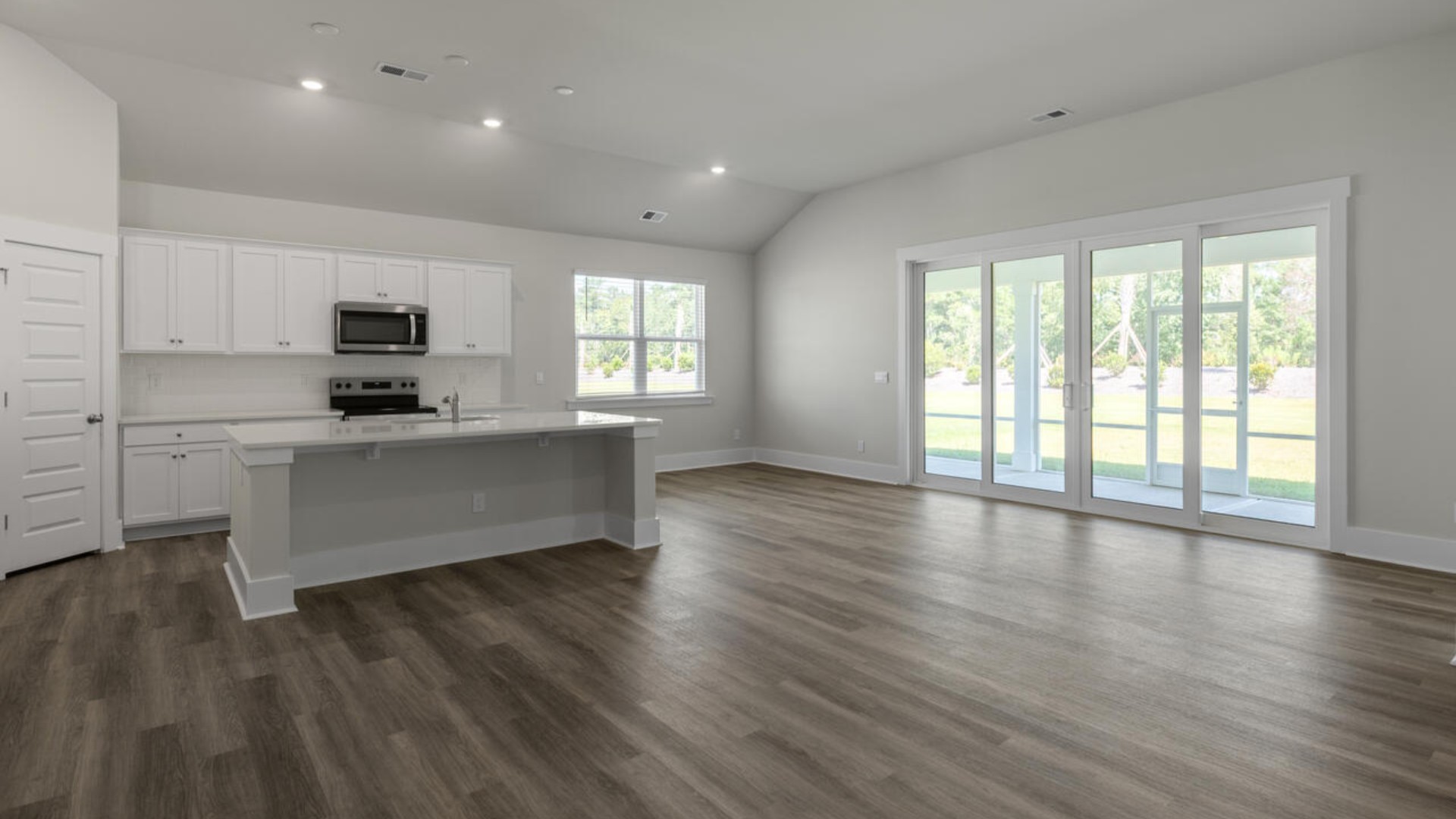 Open concept design with plenty of room for everyone to gather around the huge kitchen island.Open concept design with plenty of room for everyone to gather around the huge kitchen island.