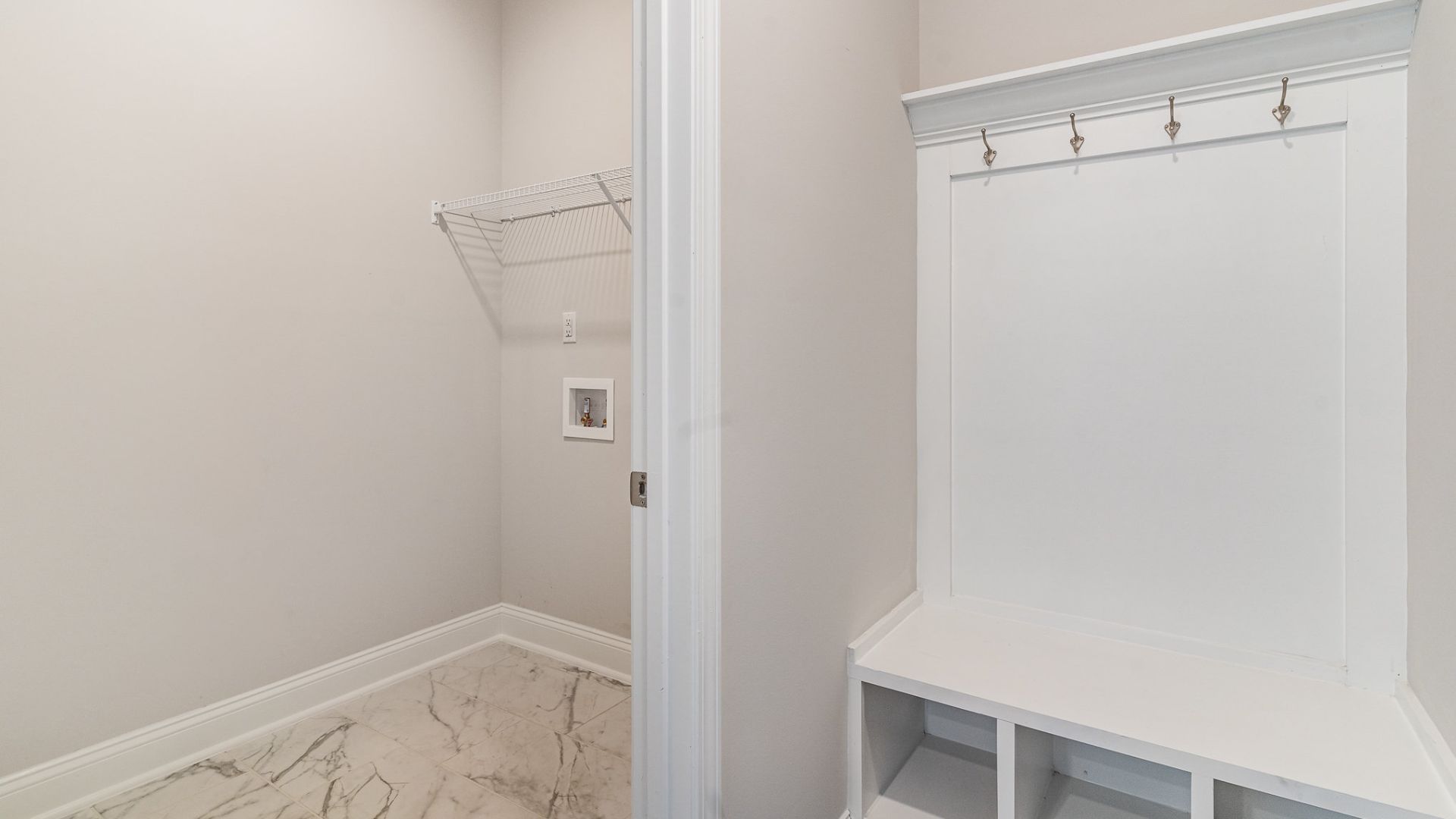 The kitchen features shaker-style cabinets, quartz countertops, and stainless steel appliances, which are sure to both turn heads and make meal prep easy. You’ll never be too far from the action with the living and dining area right there.