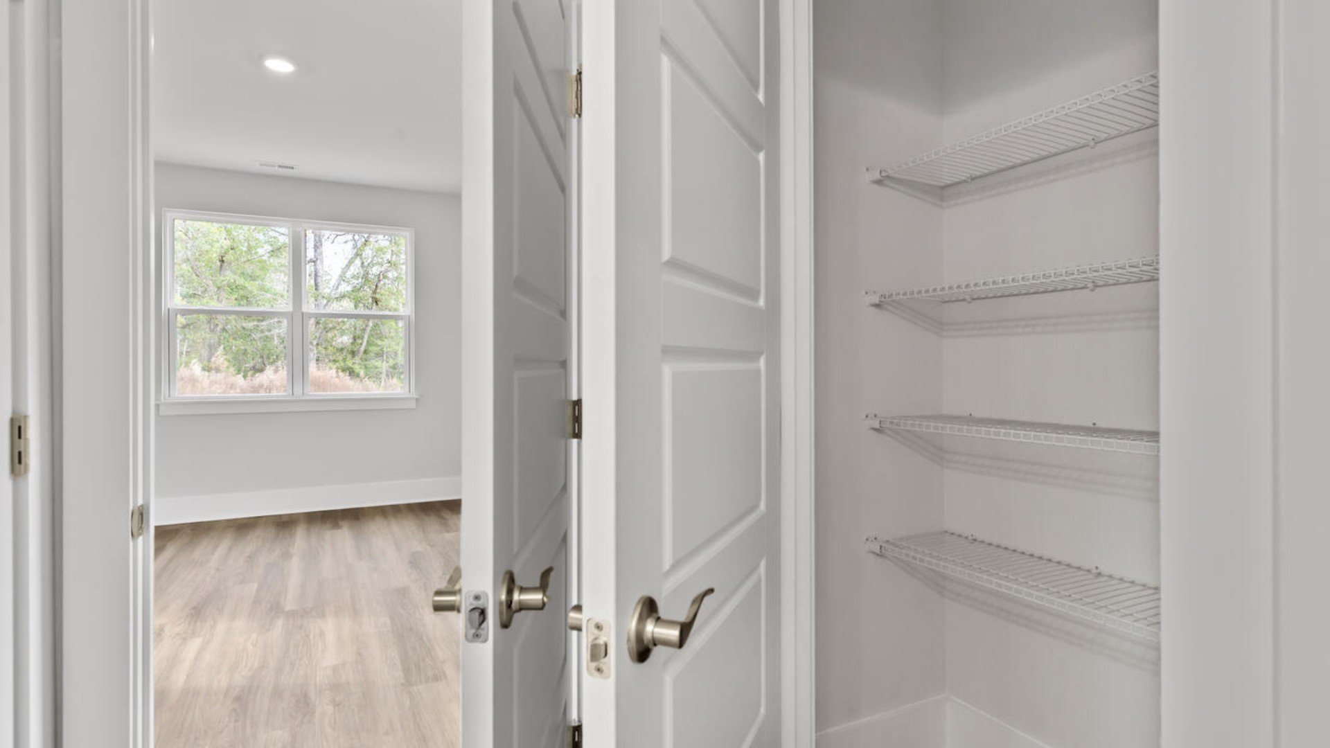 The primary bedroom has its own attached bathroom that features a walk-in closet and all the space you need to get ready in the morning.