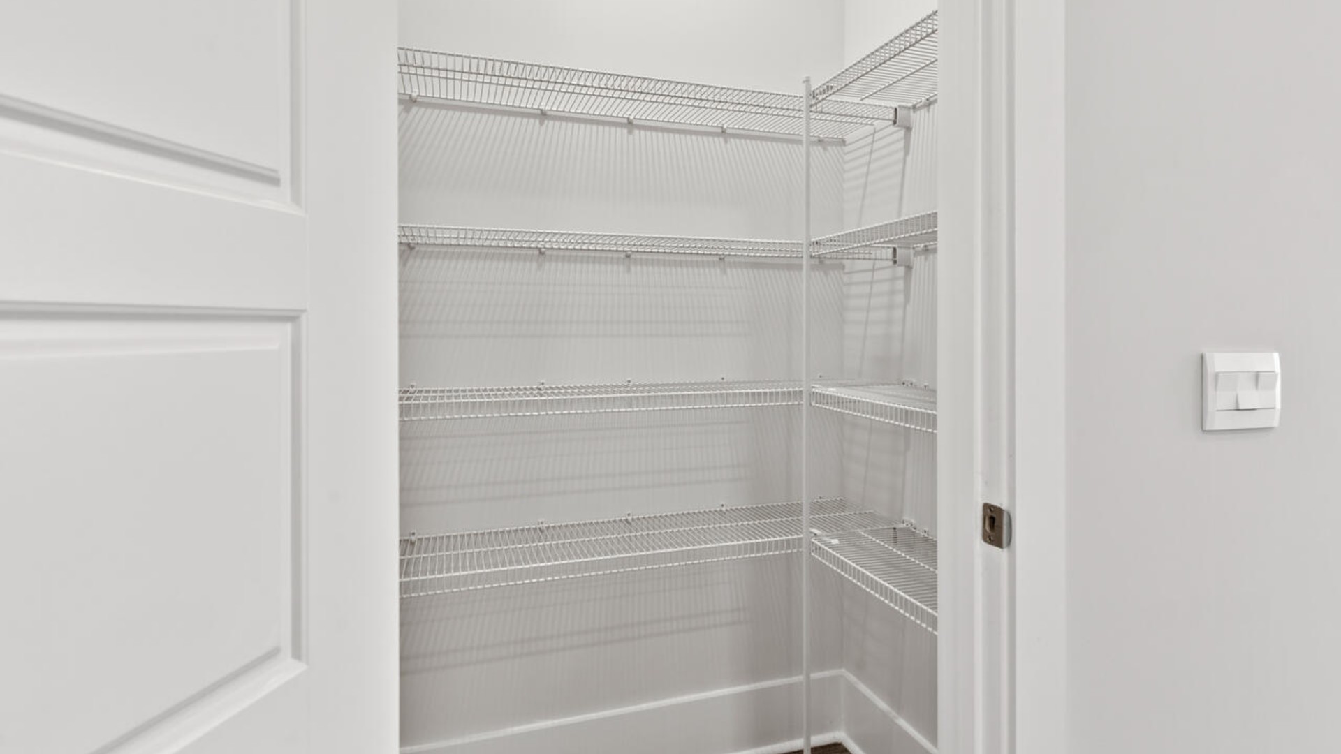 The kitchen features shaker-style cabinets, granite countertops, and stainless-steel appliances, which are sure to both turn heads and make meal prep easy. You’ll never be too far from the action with the living and dining area right there.