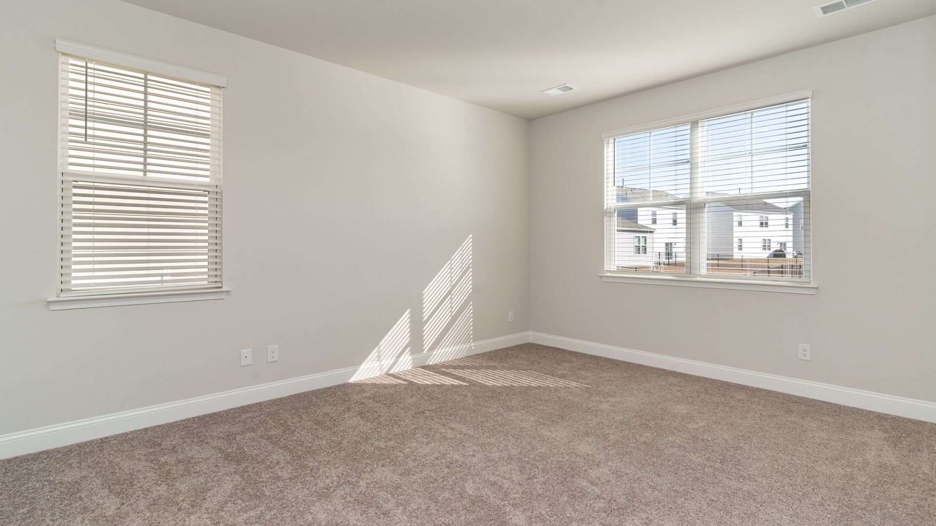 The primary bedroom has its own attached bathroom that features a walk-in closet and all the space you need to get ready in the morning. Sharing a sink isn’t a worry with the double vanity, and you also get additional privacy with a separate door for the toilet and shower.