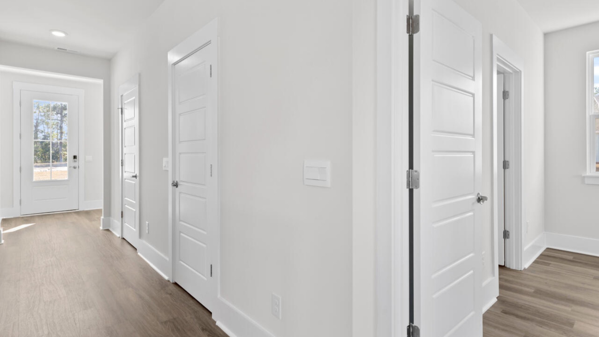 This home features a first floor primary bedroom suite and laundry room. The open concept kitchen and great room are ideal for entertaining and creating lasting memories.