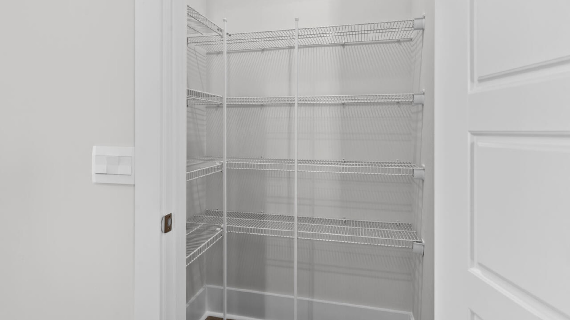 The kitchen features shaker-style cabinets, granite countertops, and stainless steel appliances, which are sure to both turn heads and make meal prep easy. You’ll never be too far from the action with the living and dining area right there.