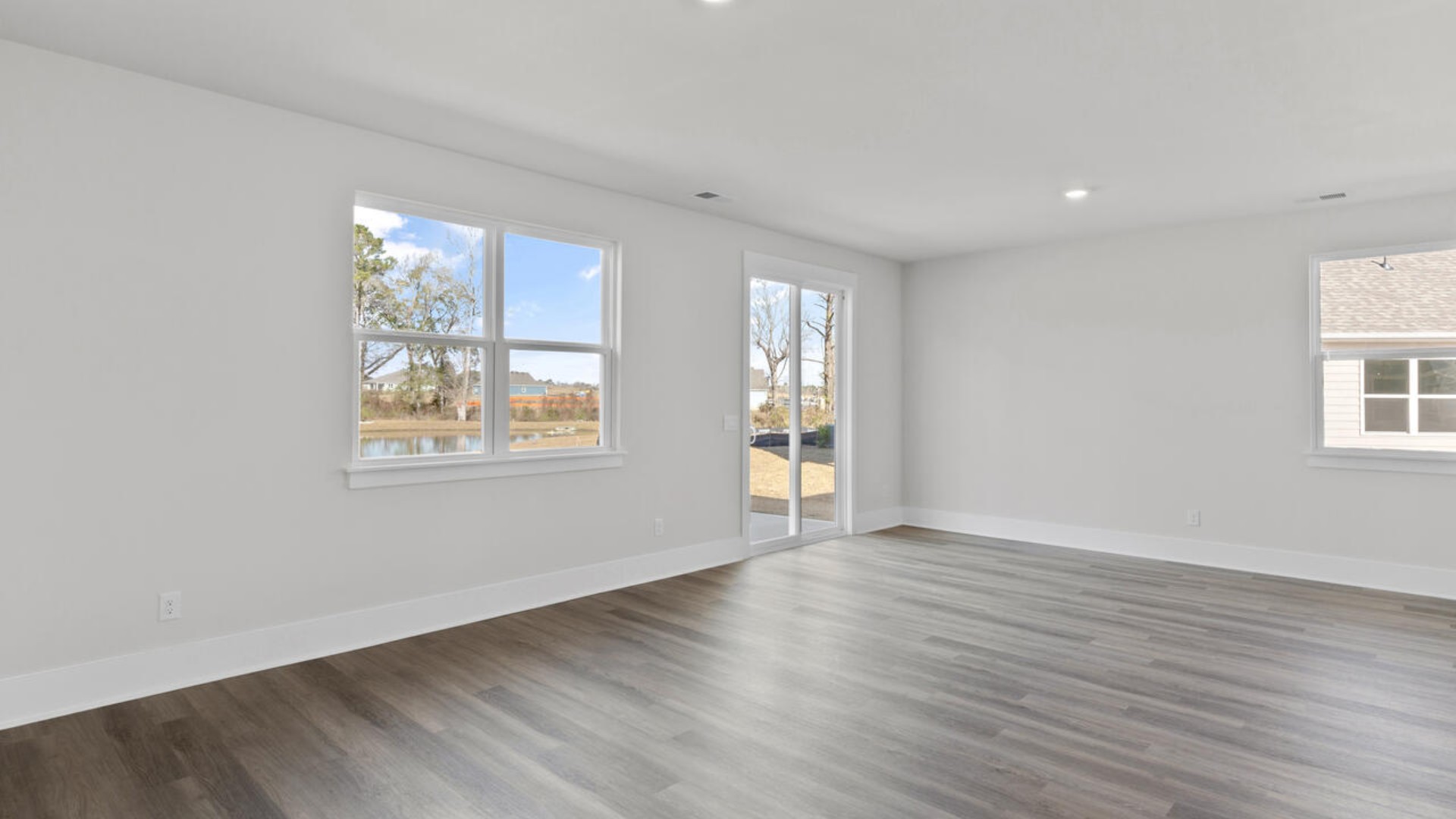 This home features a first floor primary bedroom suite and laundry room. The open concept kitchen and great room are ideal for entertaining and creating lasting memories.