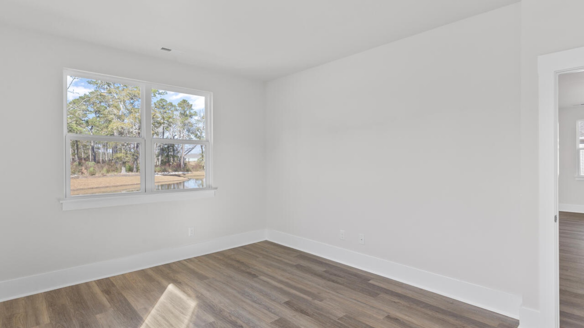 The primary bedroom has its own attached bathroom that features a walk-in closet and all the space you need to get ready in the morning.