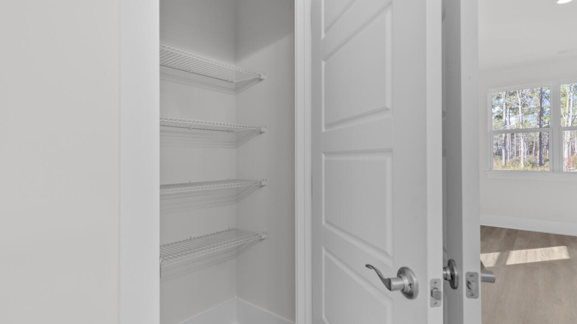 The primary bedroom has its own attached bathroom that features a walk-in closet and all the space you need to get ready in the morning.