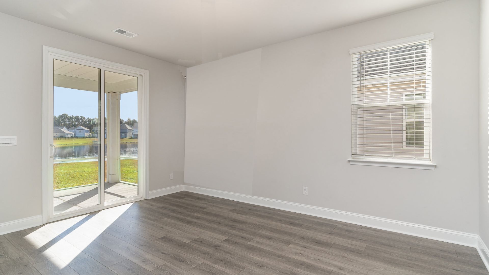 This home features a first floor primary bedroom suite and laundry room. The open concept kitchen and great room are ideal for entertaining and creating lasting memories.