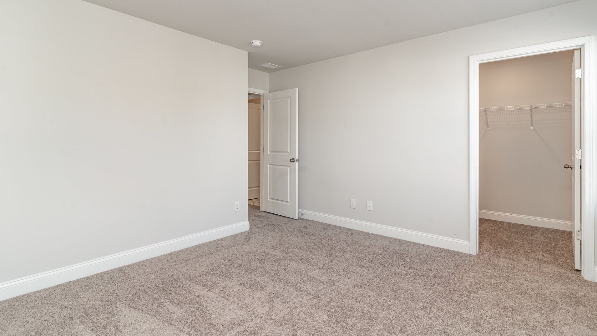 The primary bedroom has its own attached bathroom that features a walk-in closet and all the space you need to get ready in the morning. Sharing a sink isn’t a worry with the double vanity, and you also get additional privacy with a separate door for the toilet and shower.