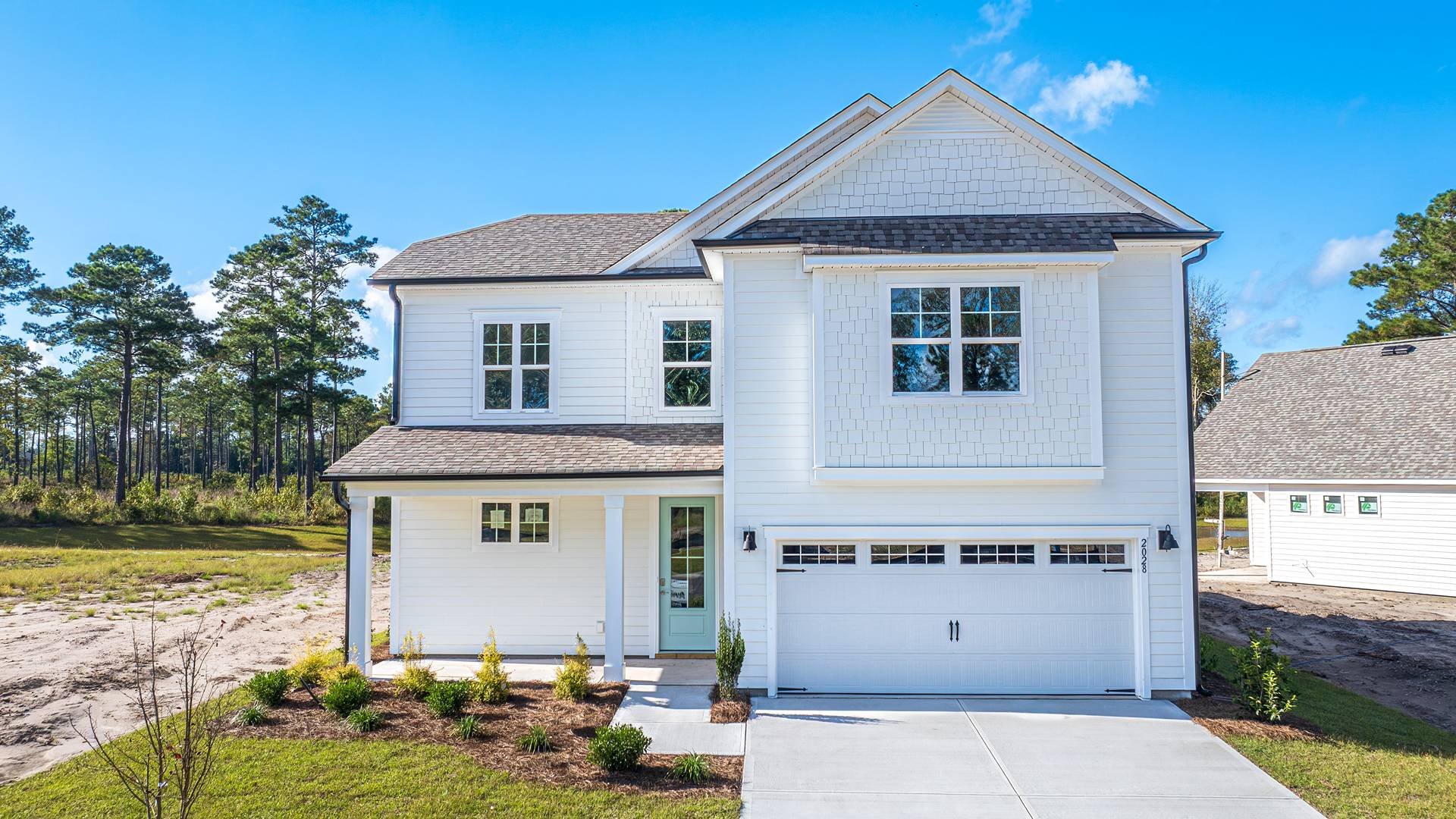 The Belfort floorplan is a 4 bedroom, 2.5 bath, 2,271 sq ft of open concept living space perfect for any stage of life. This plan is in Bolivia, North Carolina in our Rolling Hills community.