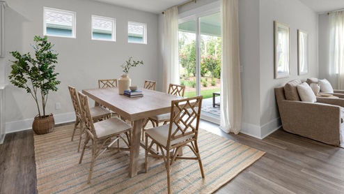 This home boasts granite kitchen counter tops, walk-in pantry, ample storage space a large kitchen island that overlooks the dining area and patio, as well as a 45-degree angle pantry for ample food storage