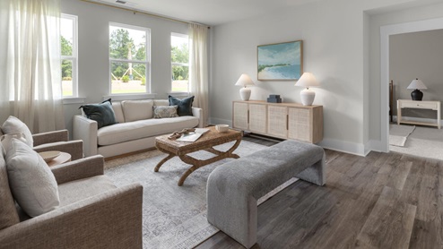 The Darby Plan in Rolling Hill, located in Bolivia, North Carolina a beautiful home is 1881 sq ft with 3 bedrooms, a study, 2 full baths on the main level, a back porch, and a two-car garage.