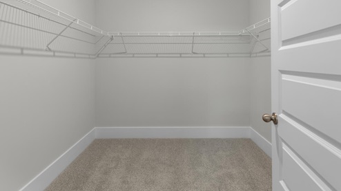 The primary suite as well as on suite is sure to impress with double vanities and a massive walk-in closet., a large, covered porch for those nice breezy sunsets! LVP floors are installed throughout the home as well as the stain resistant carpets that add comfort to the bedrooms.