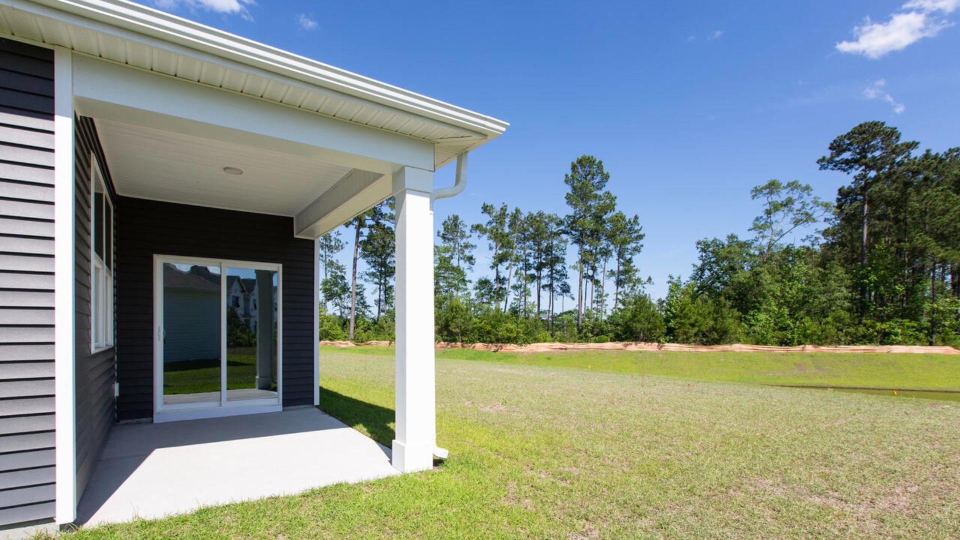 Enjoy the covered porch perfect for entertaining and enjoying the Carolina evenings