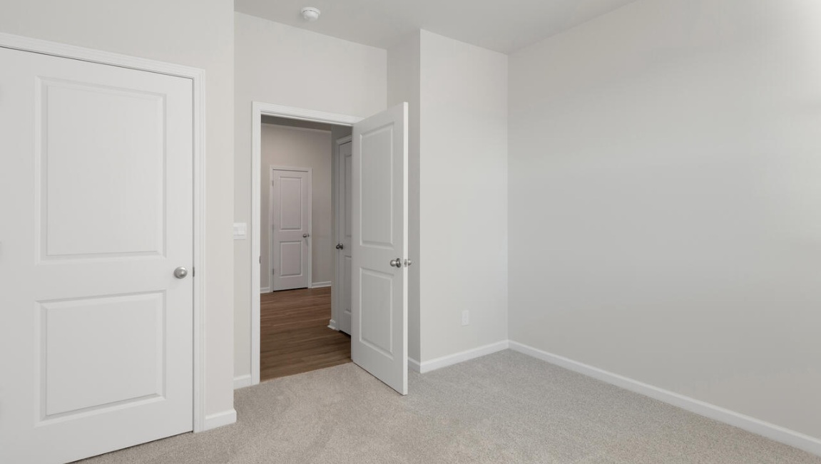 There are three additional bedrooms and full bath. In every bedroom you’ll have carpeted floors and a closet in each room.