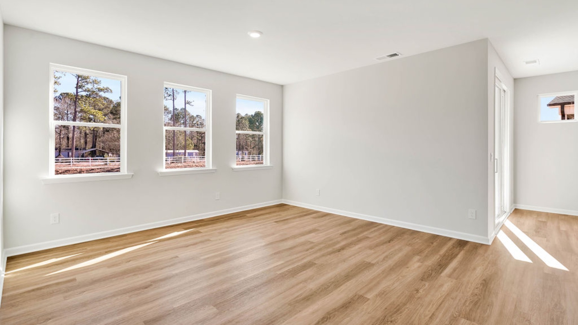 This Darby in Grayson Park, located in Leland, NC expands from its standard 1,881 sq. ft. single-story ranch layout into a 2,671 sq. ft. two-story configuration when built with the second-floor bonus