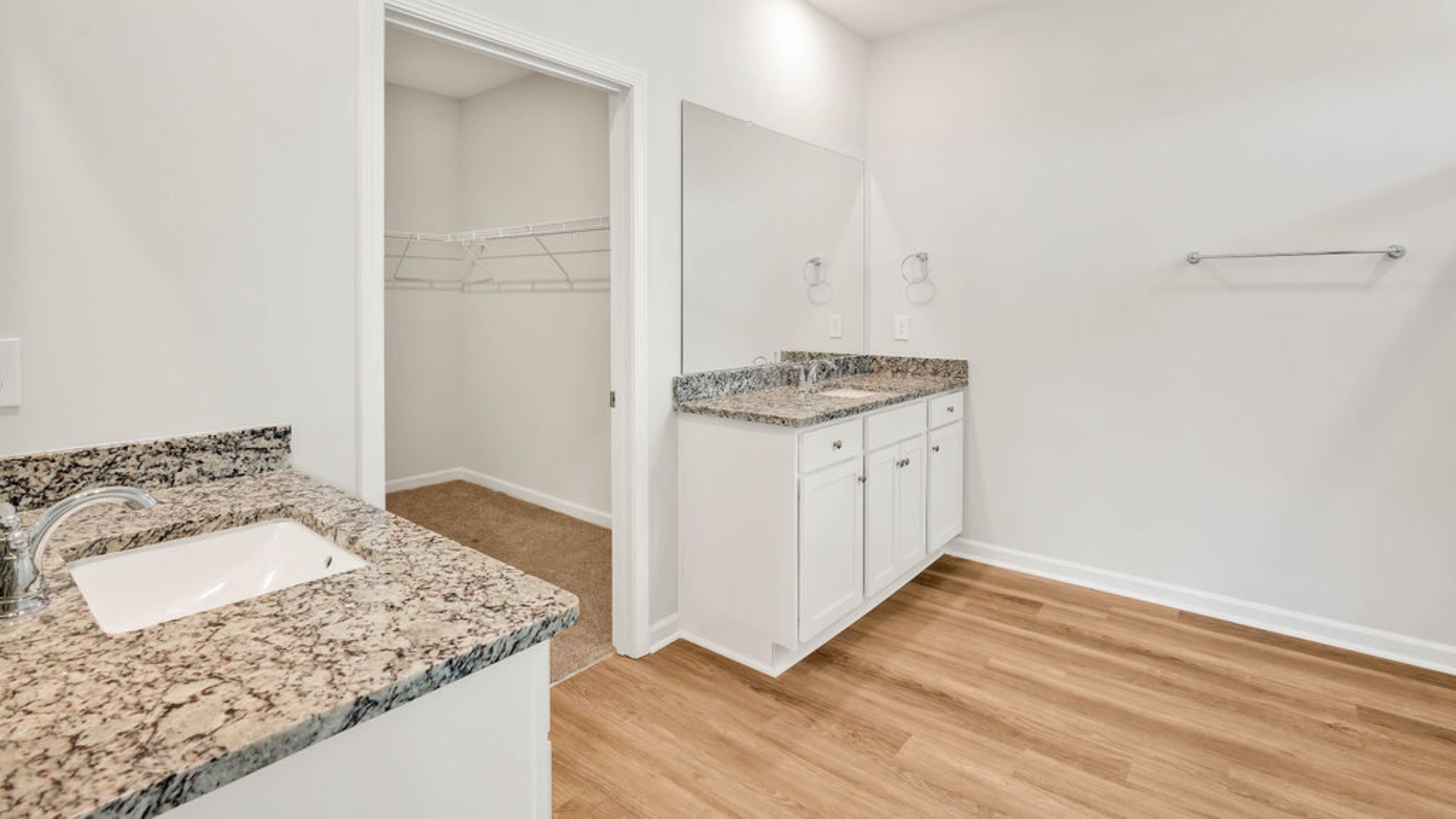 Situated entirely at the rear of the home for optimal isolation, complete with dual vanities, a large walk-in shower, and a walk-in closet. Situated entirely at the rear of the home for optimal isolation, complete with dual vanities, a large walk-in shower, and a walk-in closet.