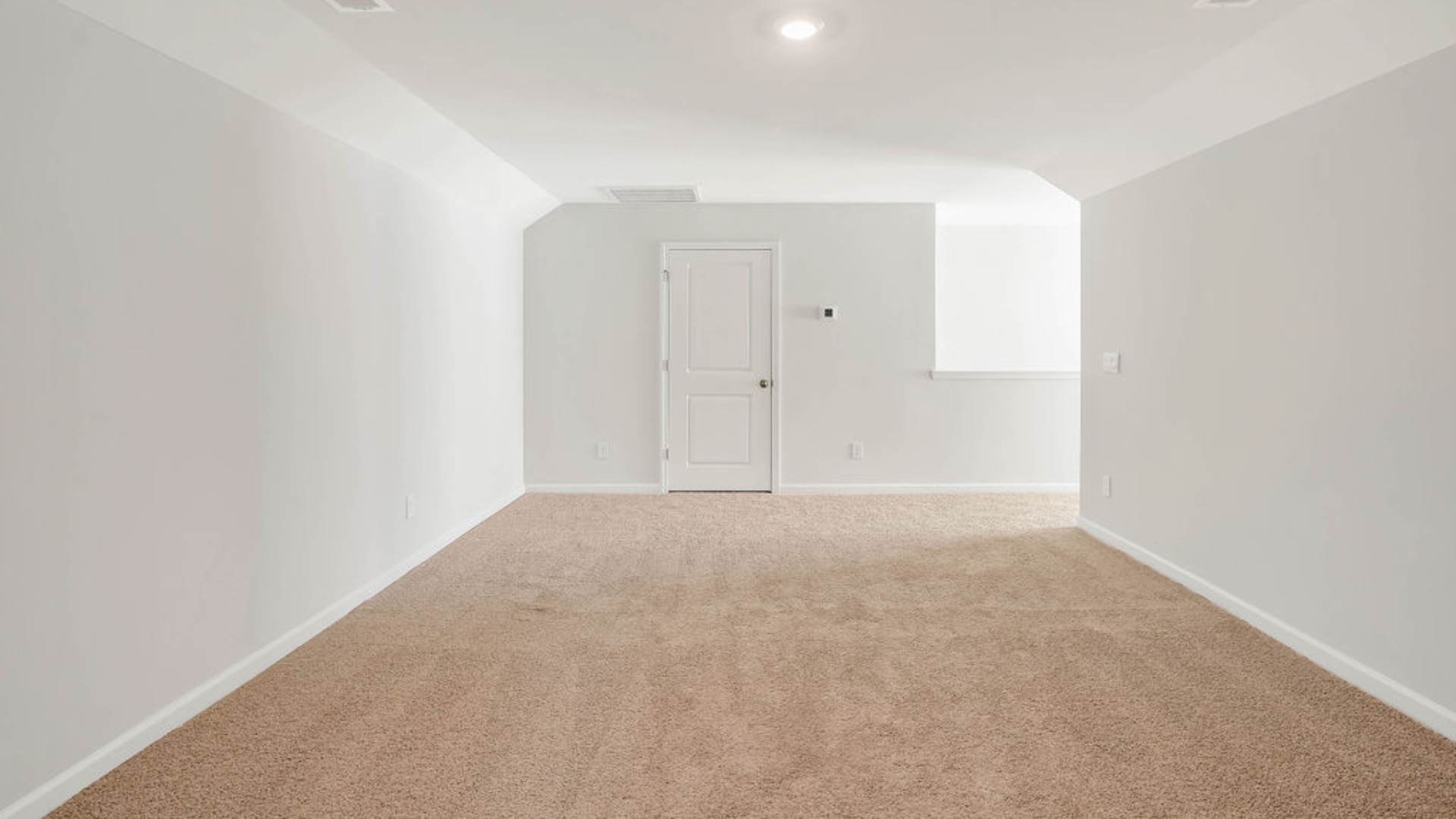 The bonus room/loft acting as a secondary living or entertainment area, this open area sits directly at the top of the stairs. It is commonly used as a playroom, home theater, or open office space. There is a bedroom quietly tucked privately past the loft space, this room serves as bedroom 5 and full bath 3. There is access to walk-in attic or conditioned storage spaces.