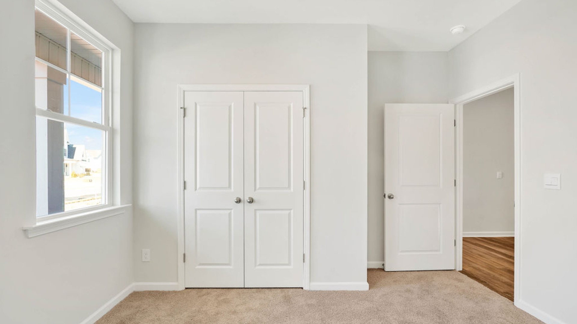 There is a bedroom at the front of the home and two additional main-floor bedrooms, and a shared full bathroom sit near the front of the home.There is a bedroom at the front of the home and two additional main-floor bedrooms, and a shared full bathroom sit near the front of the home.
