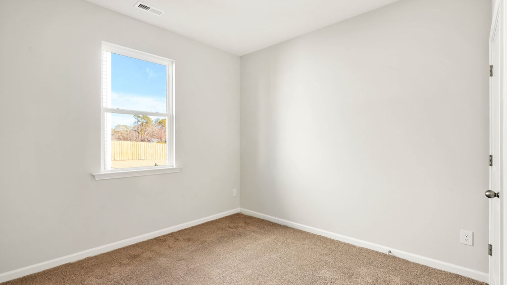 There is a bedroom at the front of the home and two additional main-floor bedrooms, and a shared full bathroom sit near the front of the home.There is a bedroom at the front of the home and two additional main-floor bedrooms, and a shared full bathroom sit near the front of the home.