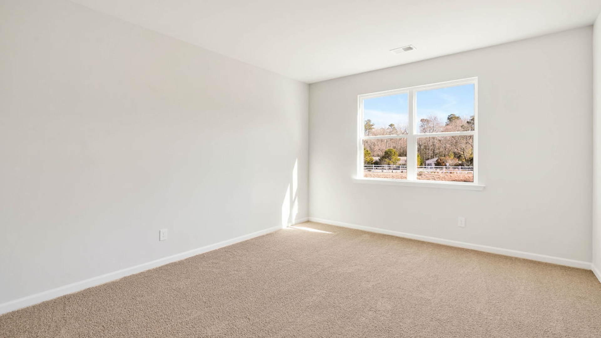 The primary bedroom has its own attached bathroom that features a walk-in closet and all the space you need to get ready in the morning. Sharing a sink isn’t a worry with the double vanity, and you also