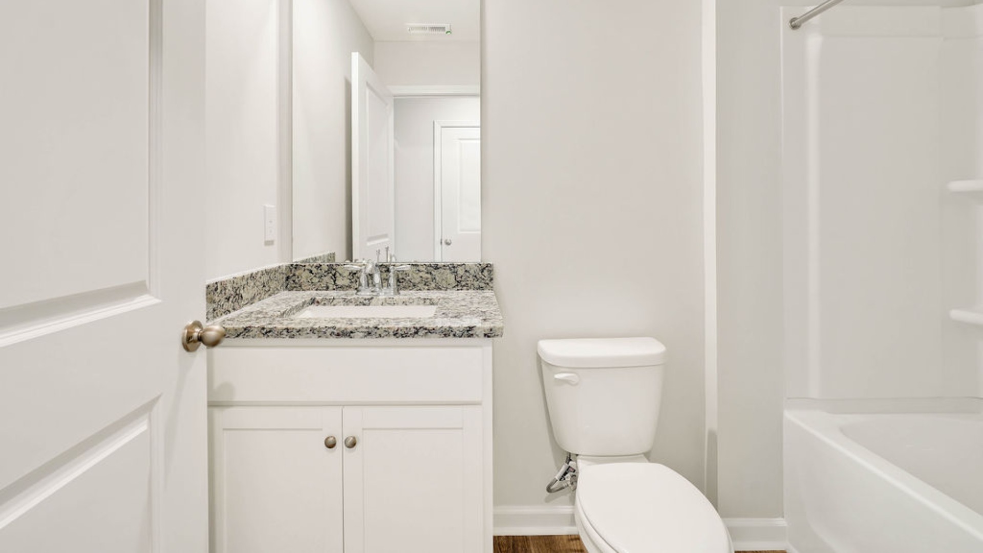 upstairs, one bedroom and a full bathroom. In every bedroom you’ll have carpeted floors and a closet in each room. Whether these rooms become bedrooms, office spaces, or other bonus rooms, there is sure to be comfort.