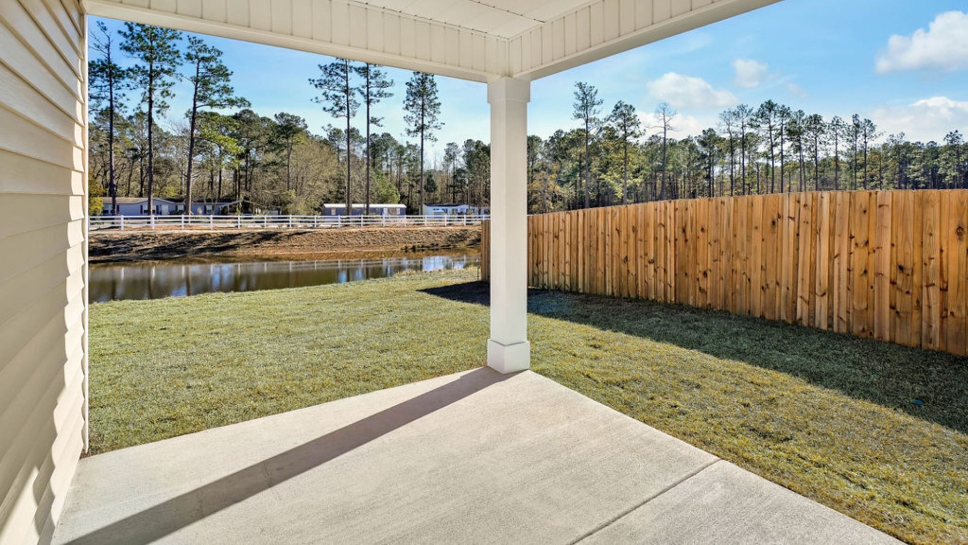 Enjoy the covered porch perfect for entertaining and enjoying the Carolina evenings.