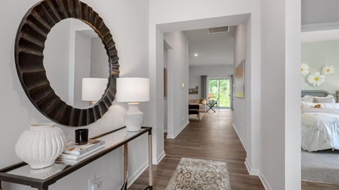 The Litchfield plan is a perfect home for beach living and entertaining. Completely open floor plan, 11-foot-high ceiling, and a large gourmet kitchen
