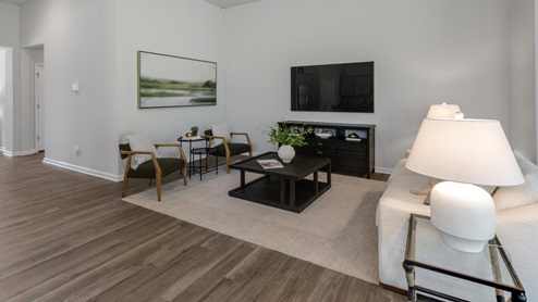 The Litchfield plan is a perfect home for beach living and entertaining. Completely open floor plan