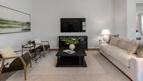 The Litchfield plan is a perfect home for beach living and entertaining. Completely open floor plan