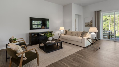 The Litchfield plan is a perfect home for beach living and entertaining. Completely open floor plan