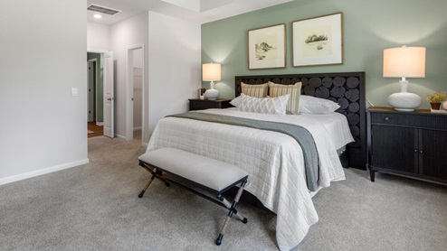. The primary suite features a step-in 5-foot shower and dual vanity. 4 panel glass sliding doors open onto large covered porch