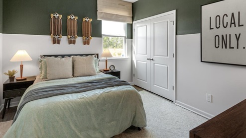 . The primary suite features a step-in 5-foot shower and dual vanity. 4 panel glass sliding doors open onto large covered porch