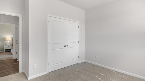 . The primary suite features a step-in 5-foot shower and dual vanity. 4 panel glass sliding doors open onto large covered porch