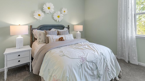 . The primary suite features a step-in 5-foot shower and dual vanity. 4 panel glass sliding doors open onto large covered porch