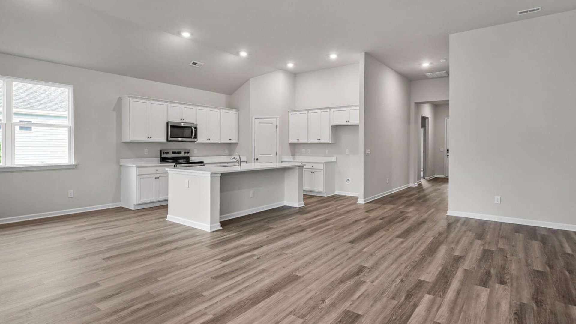 The living area is an open concept, where your kitchen, living, and dining areas blend seamlessly into a space perfect for everyday living and entertaining.