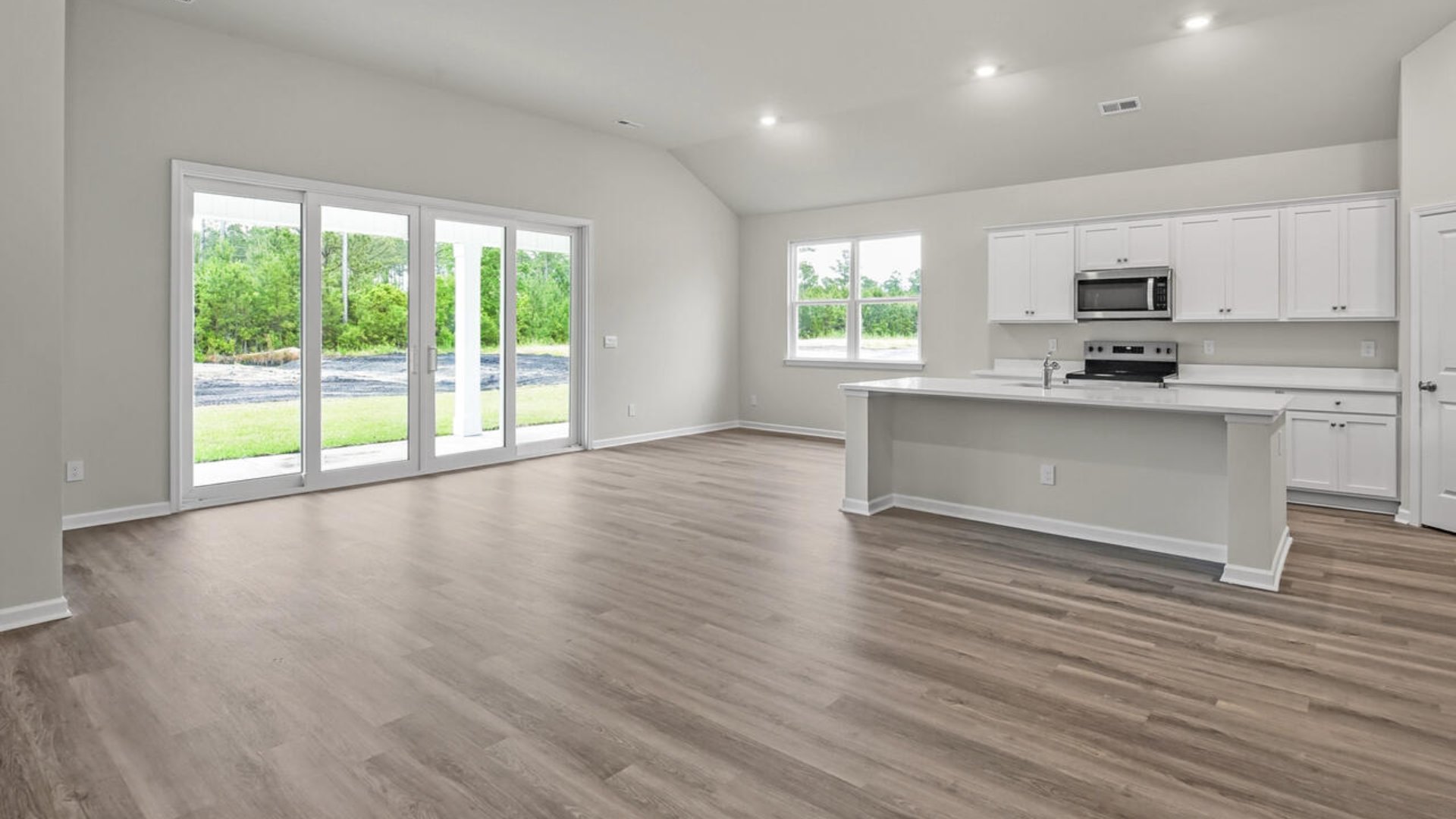 The living area is an open concept, where your kitchen, living, and dining areas blend seamlessly into a space perfect for everyday living and entertaining.