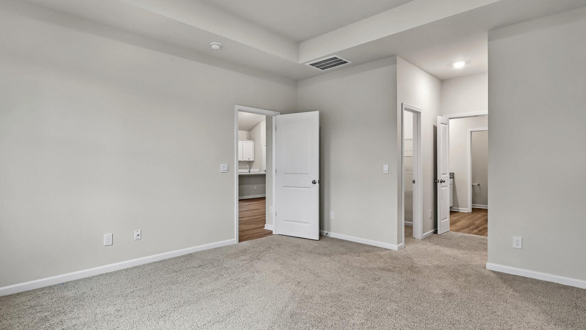 The primary suite features a step-in 5-foot shower and dual vanity. S