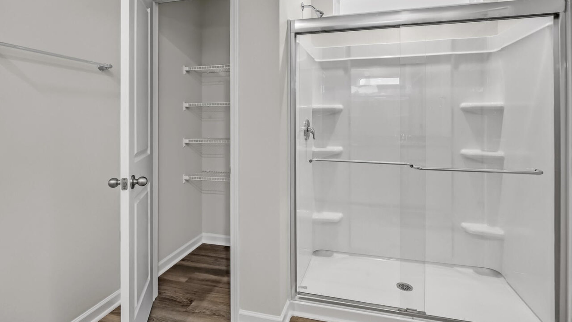 The primary suite features a step-in 5-foot shower and dual vanity. S