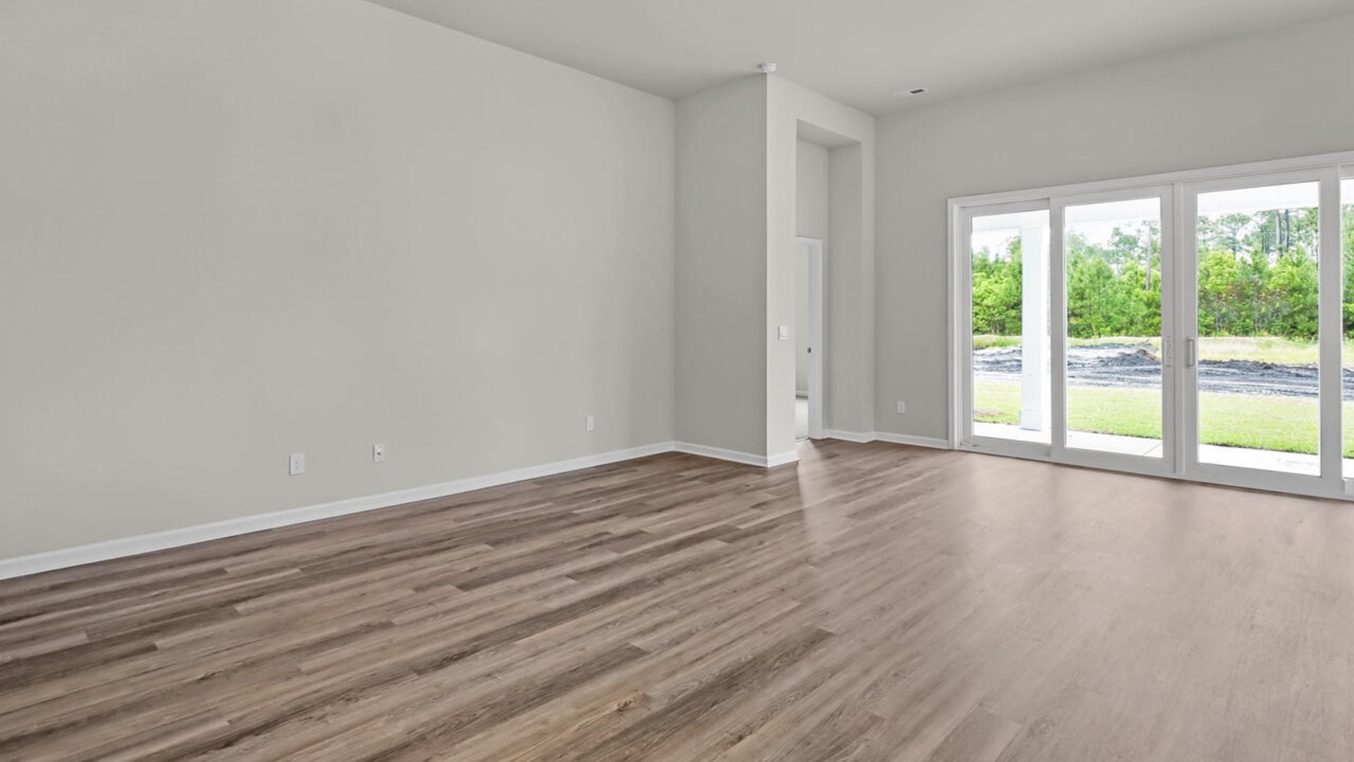 Luxury vinyl plank flooring is included throughout primary living areas, giving you a wood-like look with the durability to handle all your beach days.