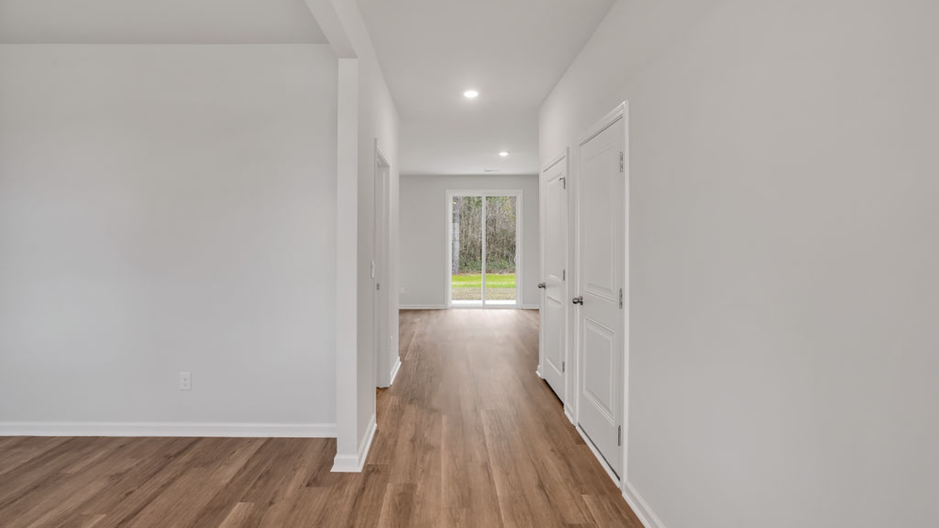 That's not all - the open-concept living room and kitchen are pure perfection, complete with granite countertops, 9' ceilings, and walk-in pantry. Oh, and did I mention it's a gas community with super-efficient tankless water heaters
