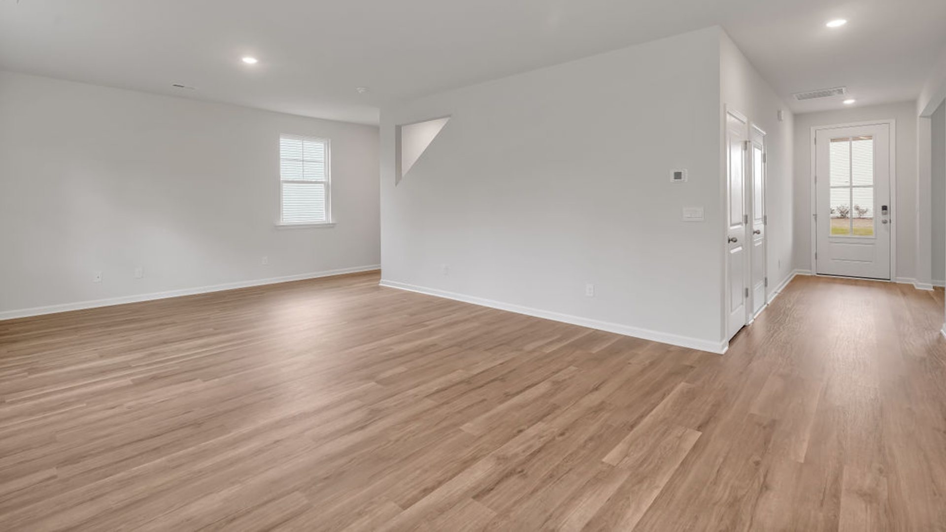 That's not all - the open-concept living room and kitchen are pure perfection, complete with granite countertops, 9' ceilings, and walk-in pantry. Oh, and did I mention it's a gas community with super-efficient tankless water heaters