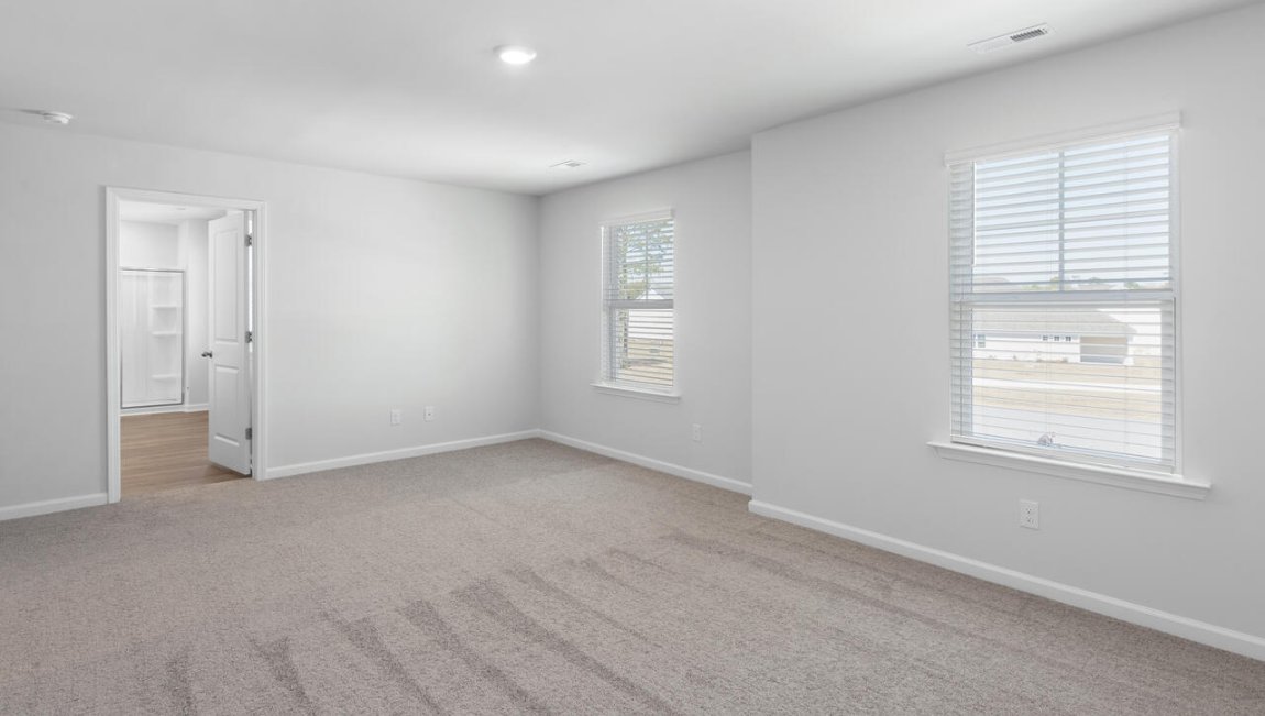 The primary bedroom has its own attached bathroom that features a walk-in closet and all the space you need to get ready in the morning. Sharing a sink isn’t a worry with the double vanity