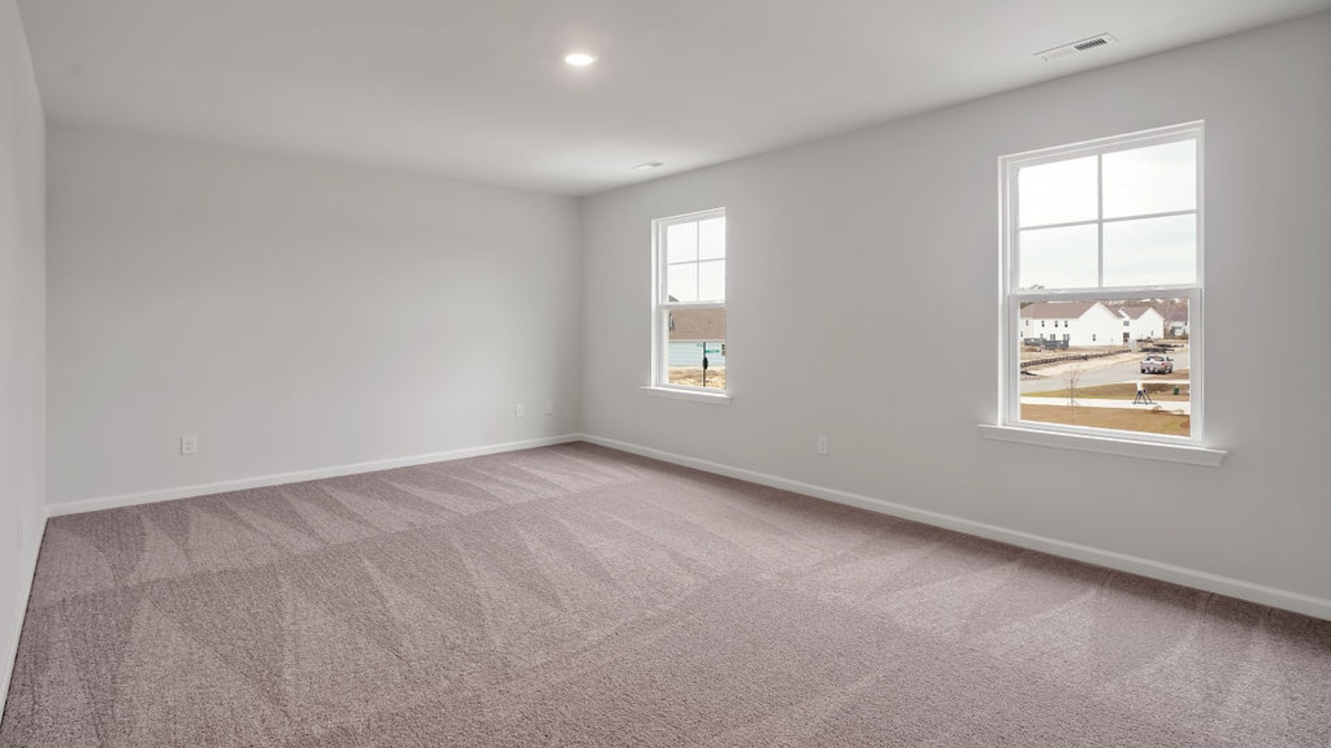 The primary bedroom has its own attached bathroom that features a walk-in closet and all the space you need to get ready in the morning. Sharing a sink isn’t a worry with the double vanity, and you also get additional privacy with a separate door for the toilet and shower.