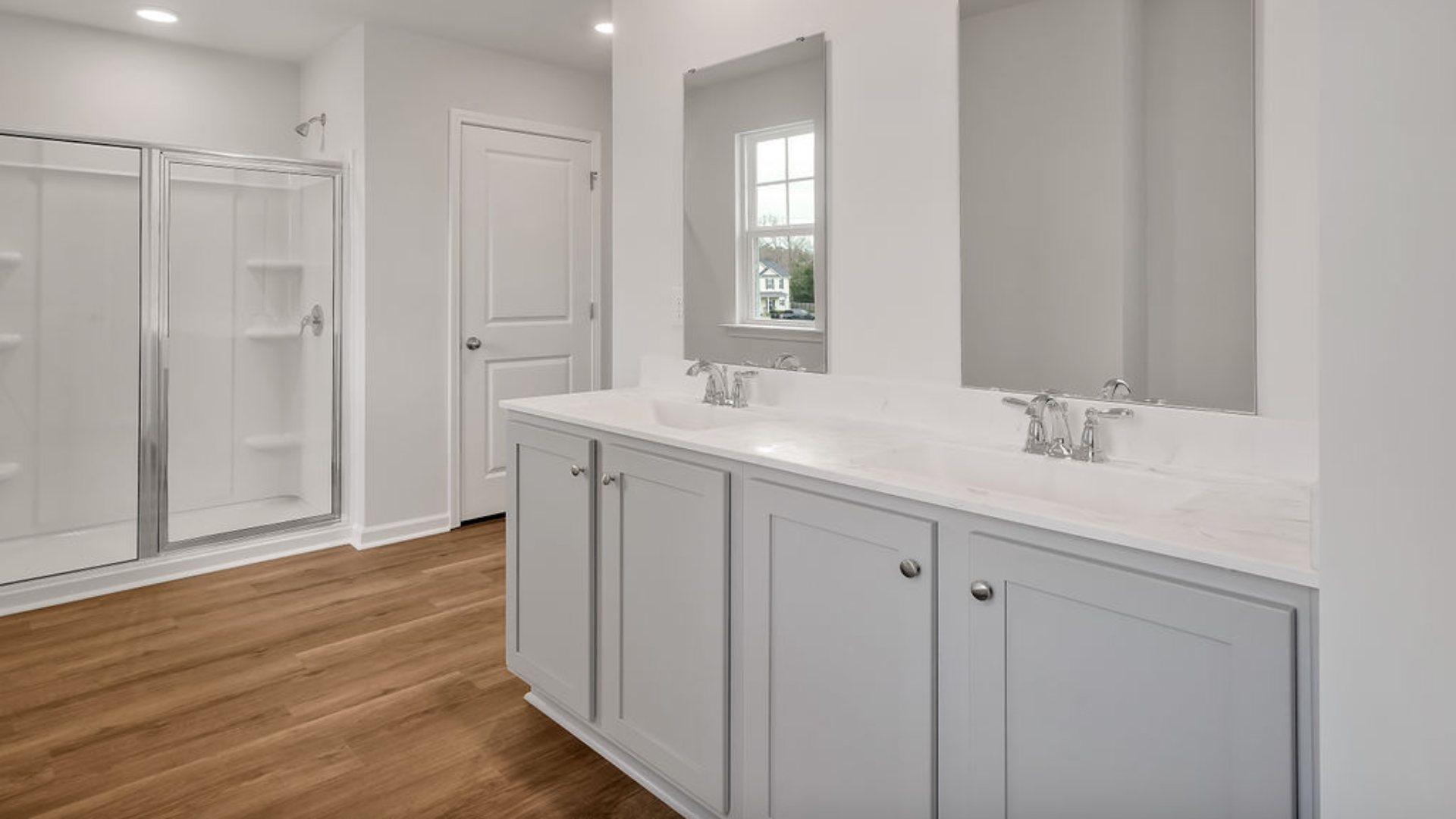 The primary bedroom has its own attached bathroom that features a walk-in closet and all the space you need to get ready in the morning. Sharing a sink isn’t a worry with the double vanity, and you also get additional privacy with a separate door for the toilet and shower.