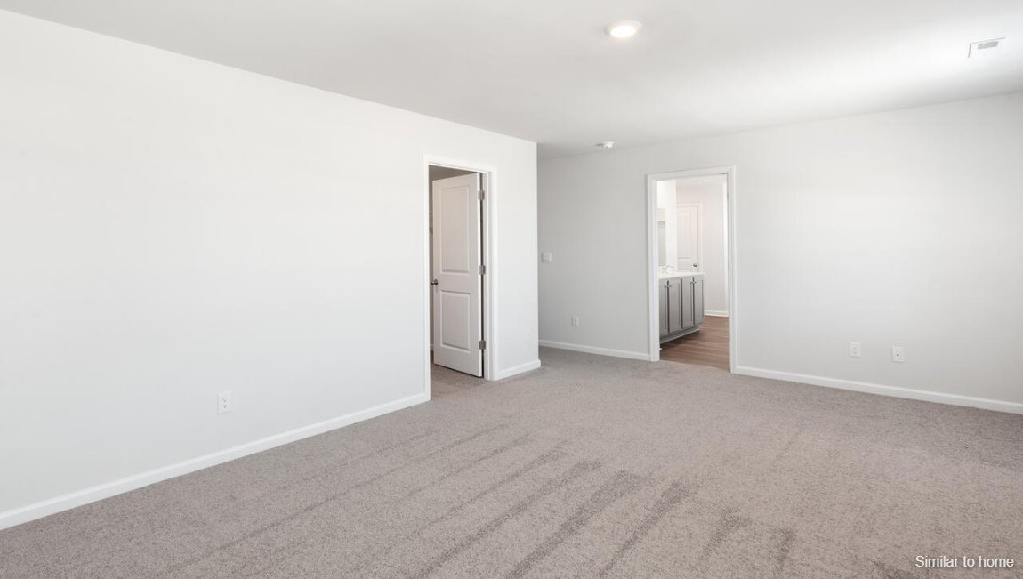 The primary bedroom has its own attached bathroom that features a walk-in closet and all the space you need to get ready in the morning. Sharing a sink isn’t a worry with the double vanity, and you also get additional privacy with a separate door for the toilet and shower.