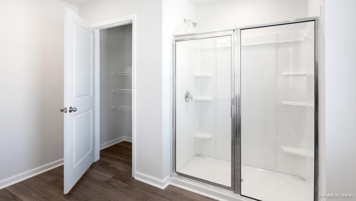 The primary bedroom has its own attached bathroom that features a walk-in closet and all the space you need to get ready in the morning. Sharing a sink isn’t a worry with the double vanity, and you also get additional privacy with a separate door for the toilet and shower.