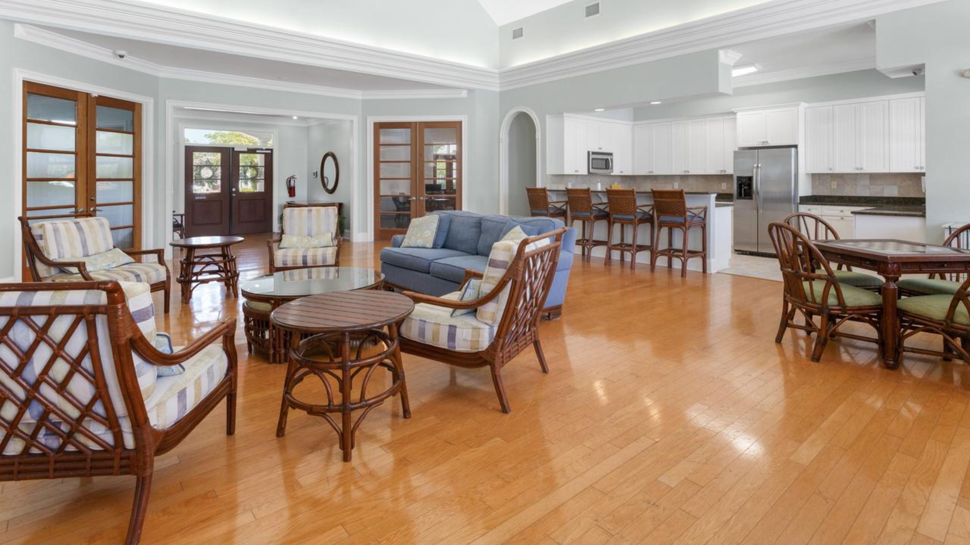 Residents have access to a range of amenities such as a well-equipped clubhouse, a fitness room, a spacious competition swimming pool, a kiddie pool, a hot tub, a sports court, a playground, and picturesque nature trails for walking.