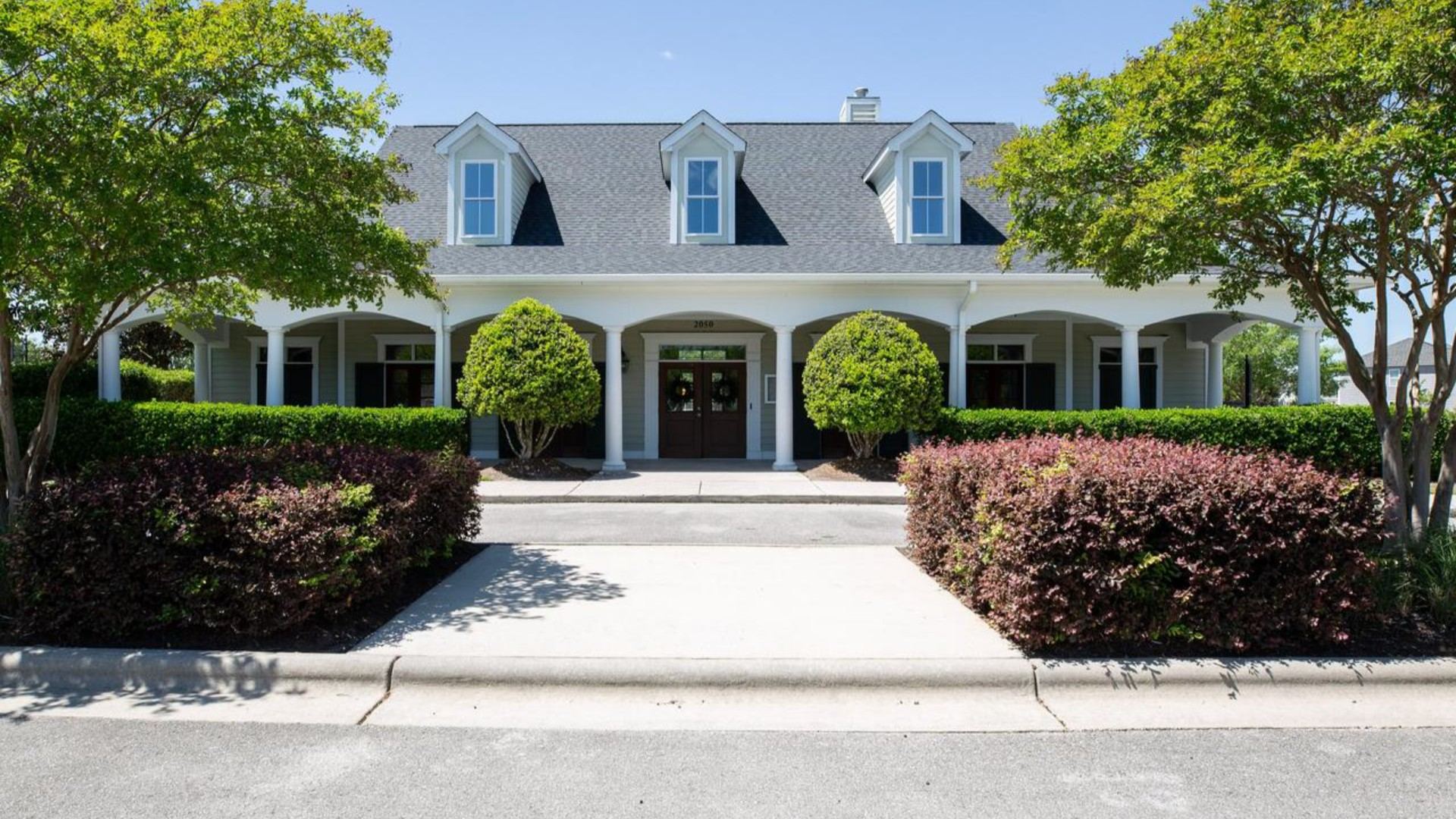 Residents have access to a range of amenities such as a well-equipped clubhouse, a fitness room, a spacious competition swimming pool, a kiddie pool, a hot tub, a sports court, a playground, and picturesque nature trails for walking.