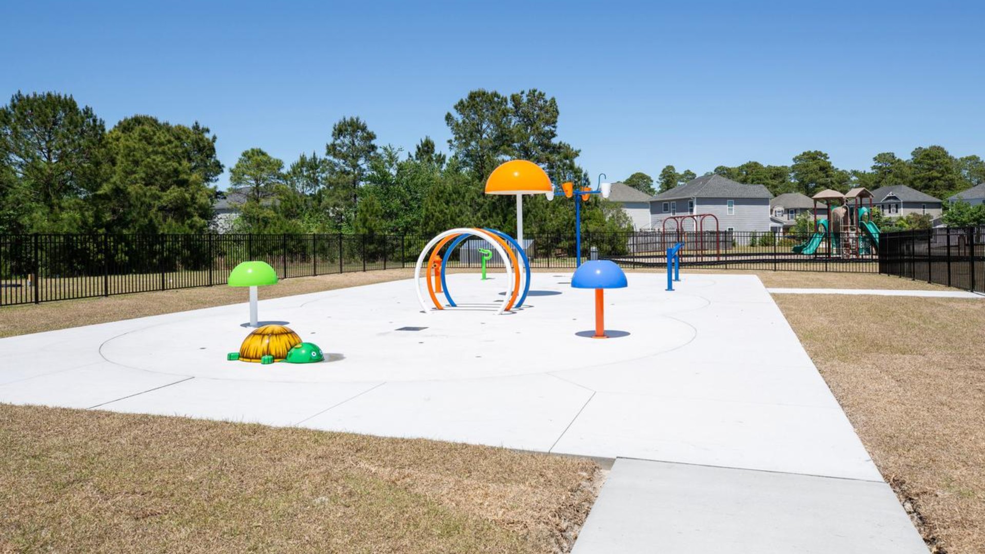 Residents have access to a range of amenities such as a well-equipped clubhouse, a fitness room, a spacious competition swimming pool, a kiddie pool, a hot tub, a sports court, a playground, and picturesque nature trails for walking.