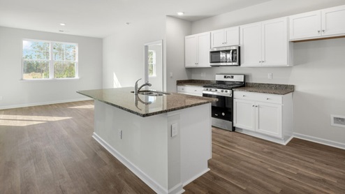 New Homes in Leland NC. Grayson Park. Amenities. Pool. Tennis, Clubhouse. Aria floor plan is complete with granite kitchen countertops, a counter height oversized kitchen island, cultured marble bathroom counters, and expansive 9ft ceilings.